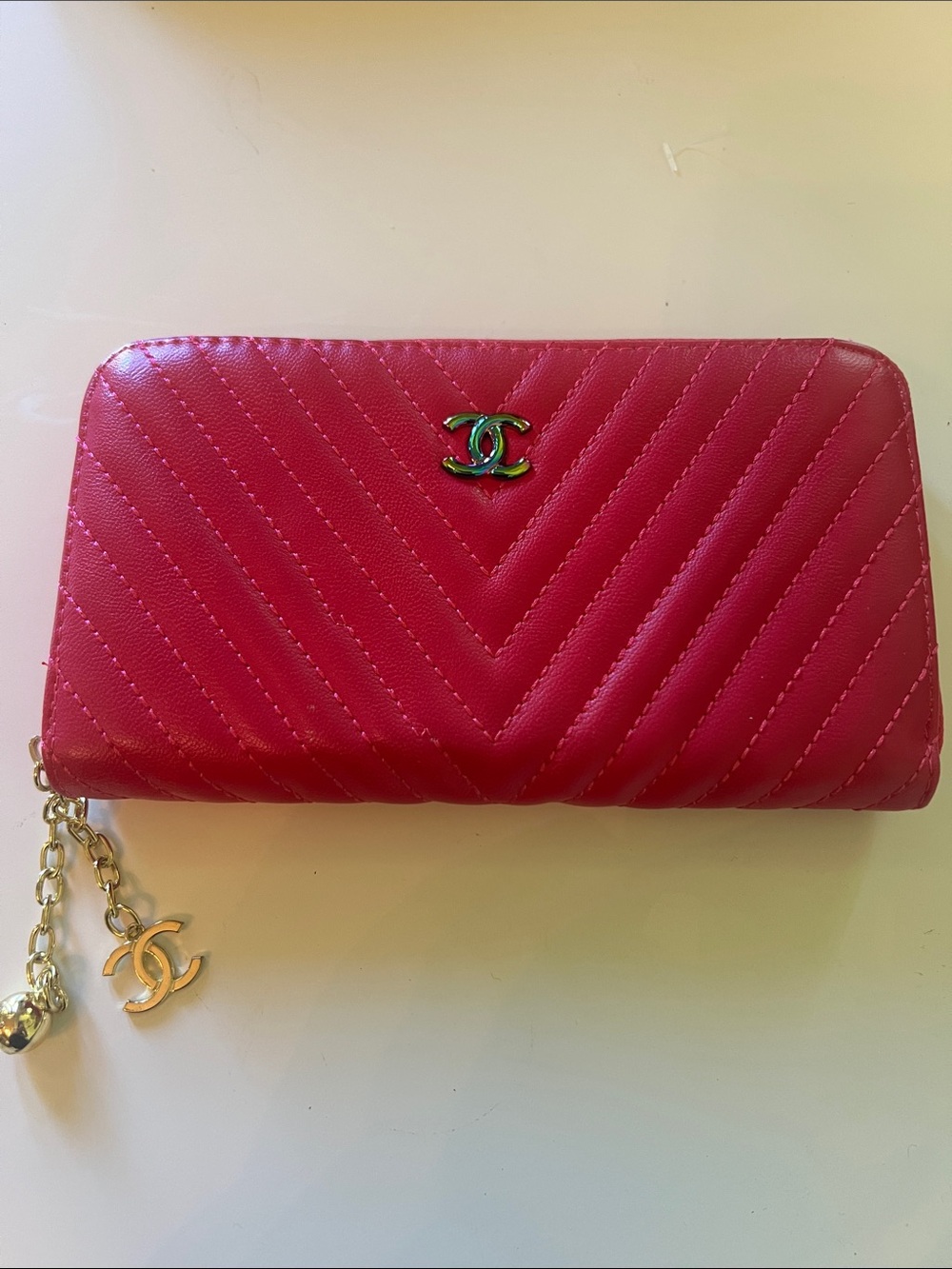 Chanel multicolored logo Chevron Quilted Zip Wallet in Hot Pink